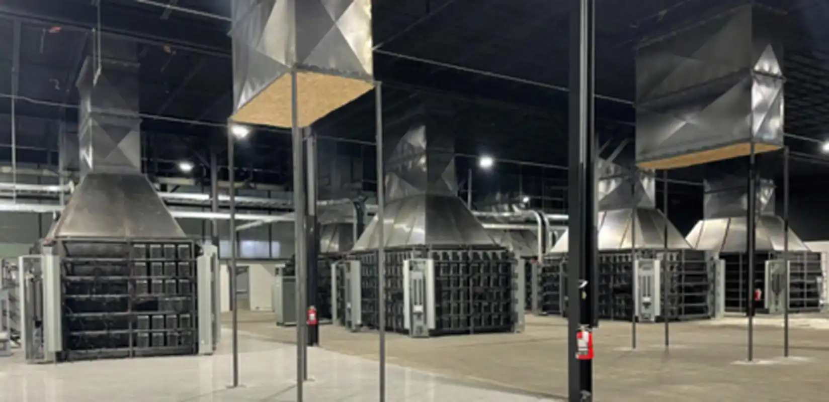 A modern mining farm brimming with activity, showcasing the scale of industrial cryptocurrency mining
