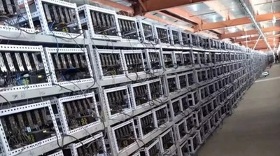 A bustling mining farm hosting numerous rigs, highlighting the collaborative environment for efficient BTC and ETH mining
